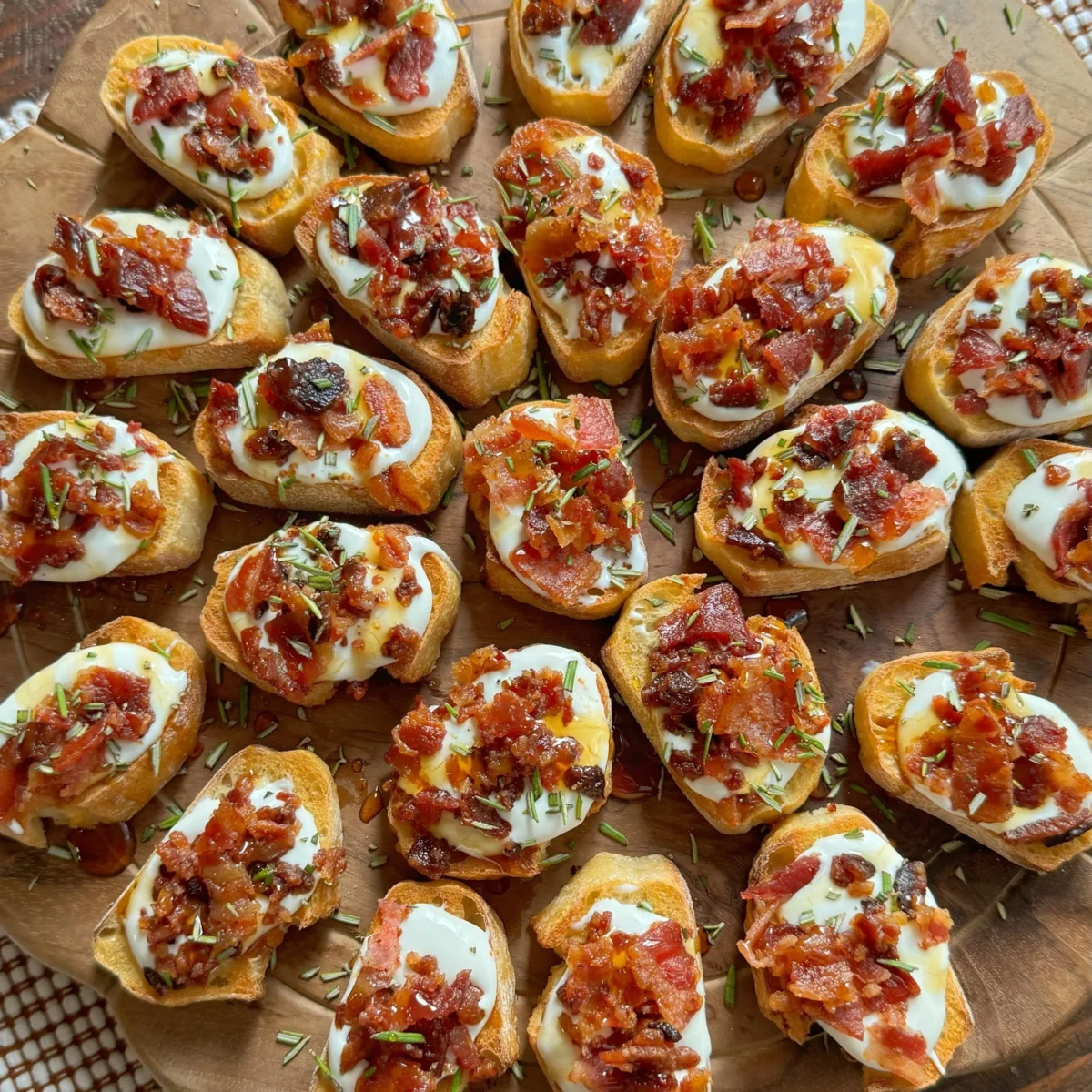Whipped Goat Cheese Crostini with Bacon and Hot Honey Drizzle