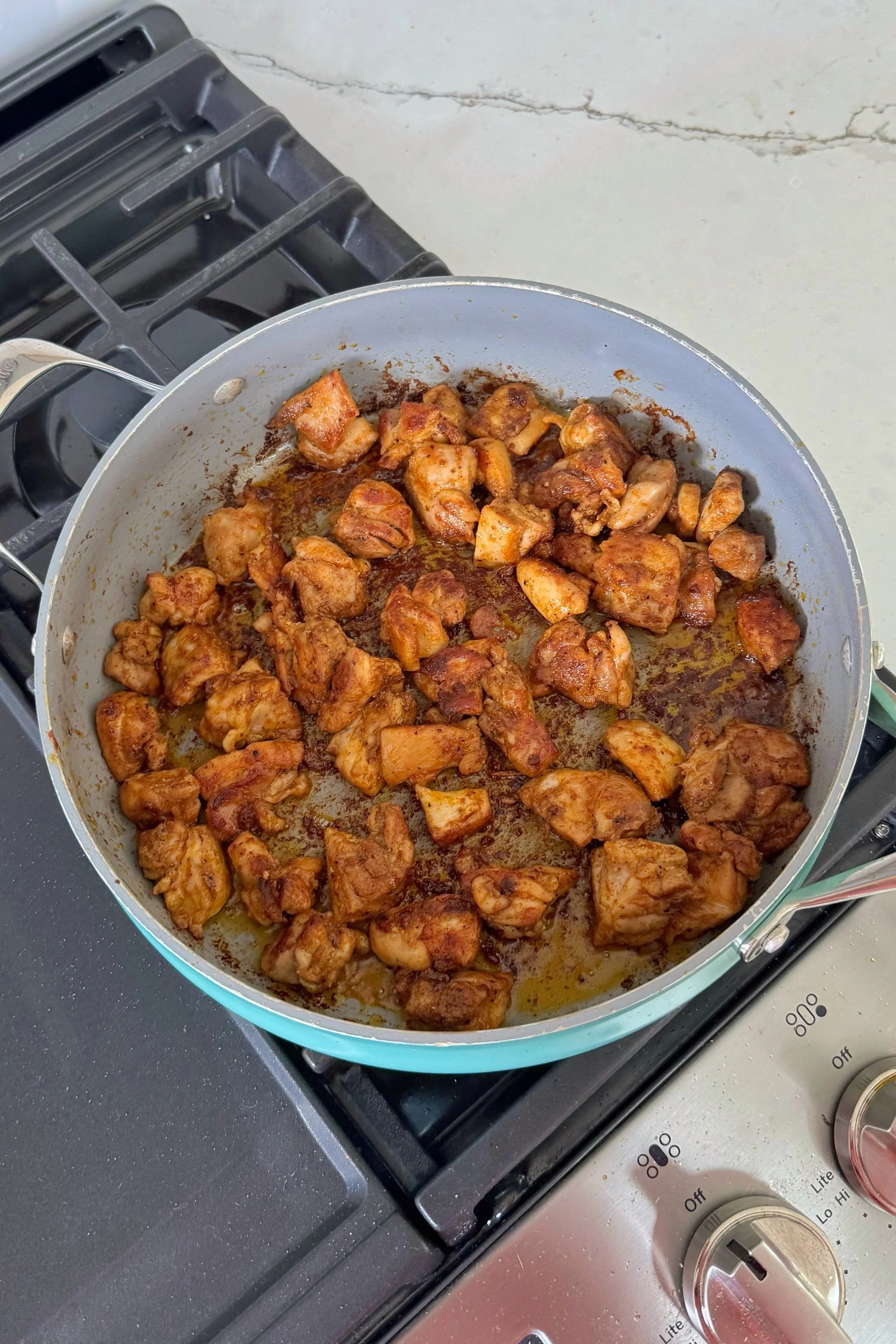 A pan with cooked crispy chicken.