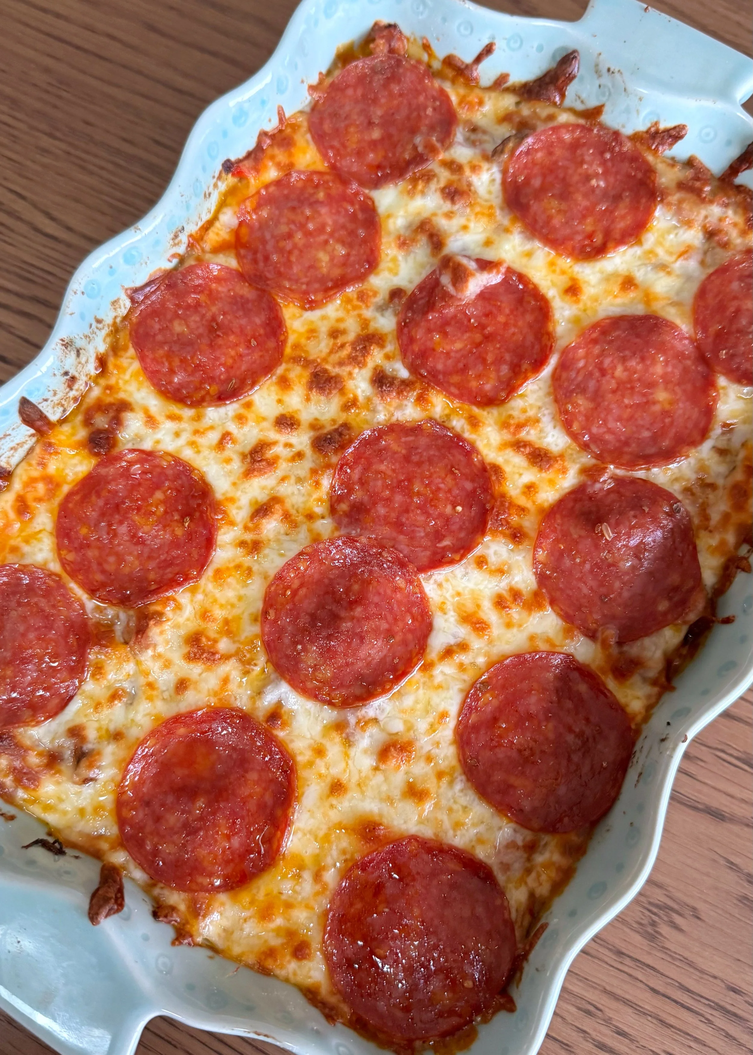 A baking dish with spaghetti squash pizza casserole.